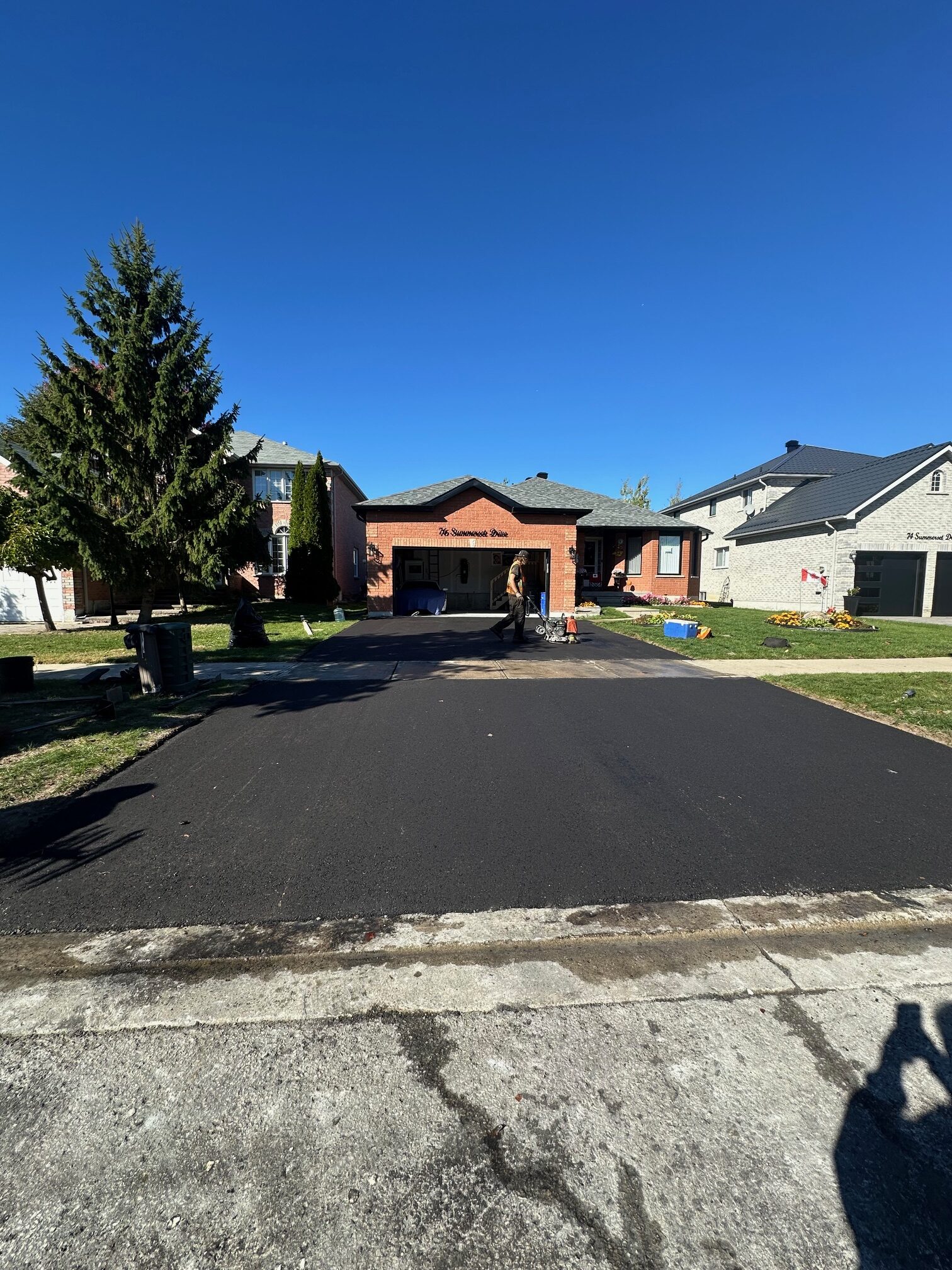 Fixing or replacing asphalt driveways